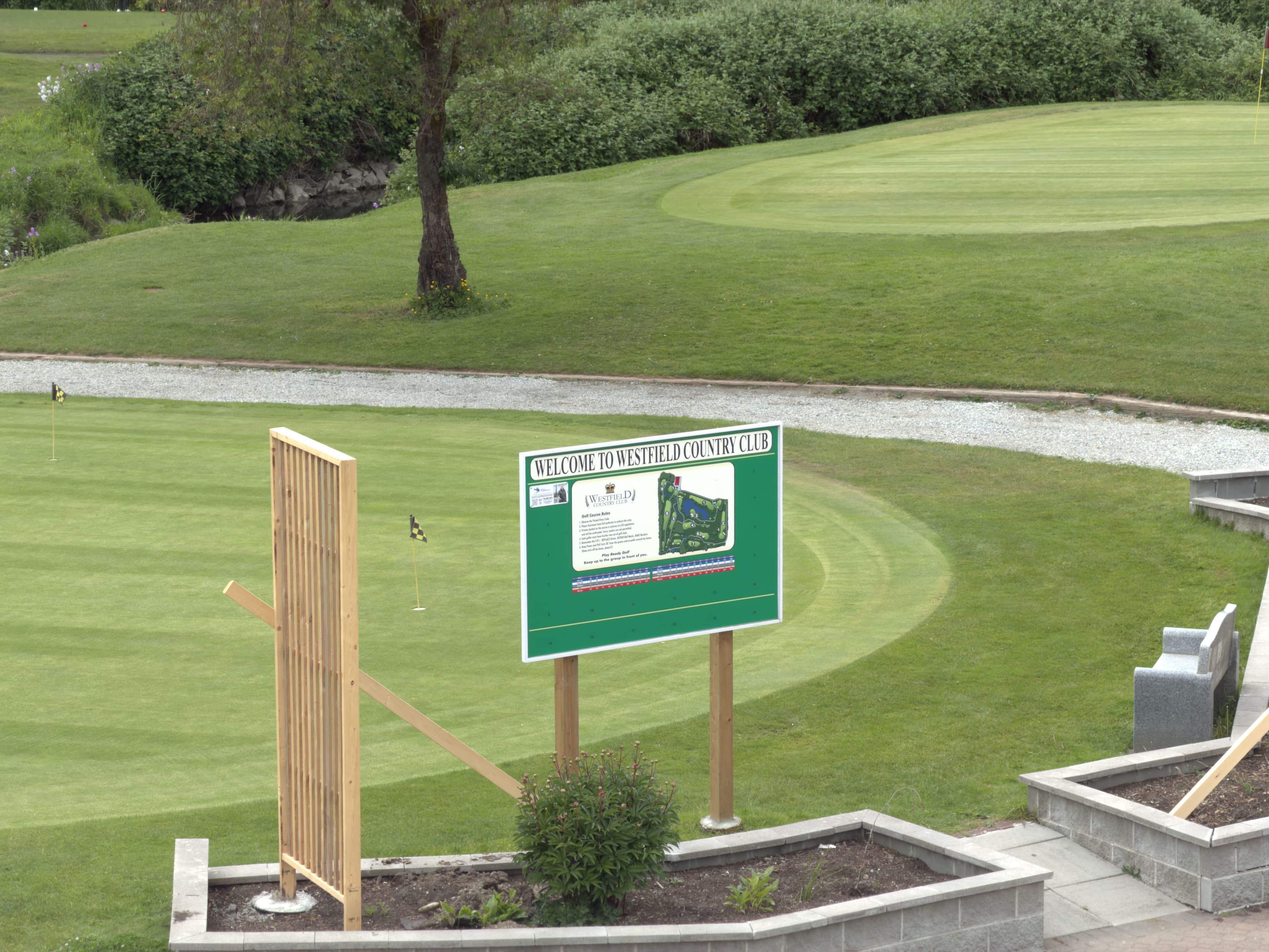 Golfer addressing the ball before an approach shot from the fairway
